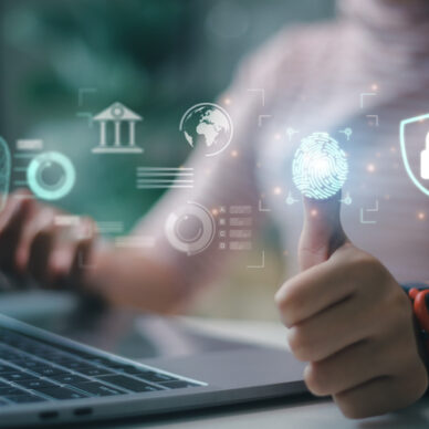 Women use fingerprint identification to access personal financial data. for E-KYC electronic know your customer, biometrics security, innovation technology against digital cybercrime Women use fingerprint identification to access personal financial data. for E-KYC electronic know your customer, biometrics security, innovation technology against digital cybercrime
